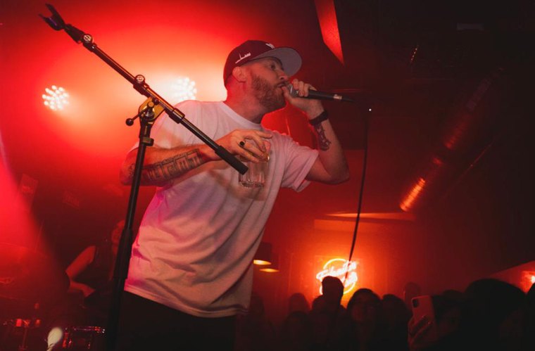 Rel McCoy performing live on the mic